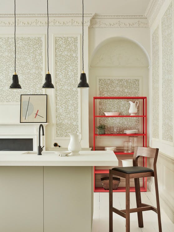 Kitchen counter with neutral green floral wallpaper (Briar Rose - Grene Stone) and neutral green paint on the walls.