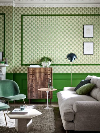 Living room featuring leaf wallpaper (Clutterbuck - Lodge) alongside green panelling (Sage & Onions) and ceiling with coving.