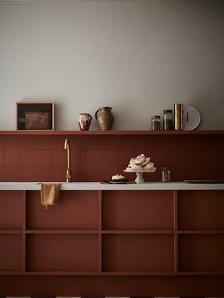 Kitchen with the upper wall painted in neutral shade 'Slaked Lime - Mid' and the lower wall and cabinets in terracotta 'Muscovado'.