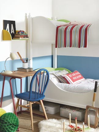 Children's bedroom with white bunk beds and the lower wall painted in pale blue 'Tivoli' with toys, a small desk and chair.