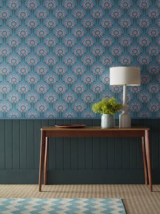 Hallway featuring blue floral wallpaper (Hencroft - Azure) and dark green paneling and baseboards in Harley Green.