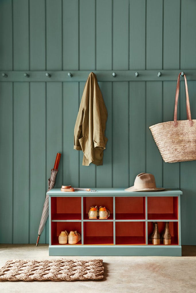 Paneled mudroom painted in the green shade, Pleat, primed with Little Green Intelligent ASP.