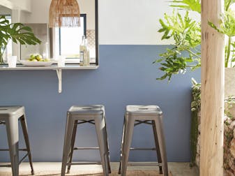 Warm blue (Juniper Ash) outdoor breakfast bar with gray bar stools.