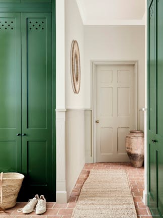 Hallway with various Portland Stone shades on the walls and ceiling, alongside a dark green (Dark Brunswick Green) cupboard.