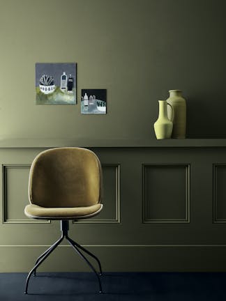 Mustard yellow velvet chair against a dark green panelled wall in Olive Colour and a dark indigo blue floor in Dock Blue.