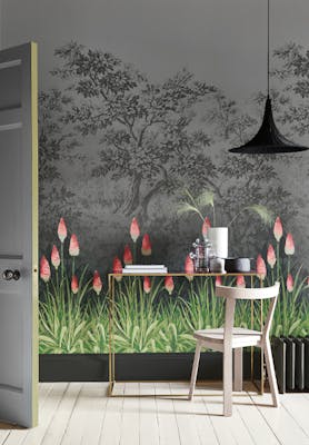 Grey forest wallpaper with pink torch lilies at the forefront (Upper Brook Street - Minuit) behind a desk and chair.