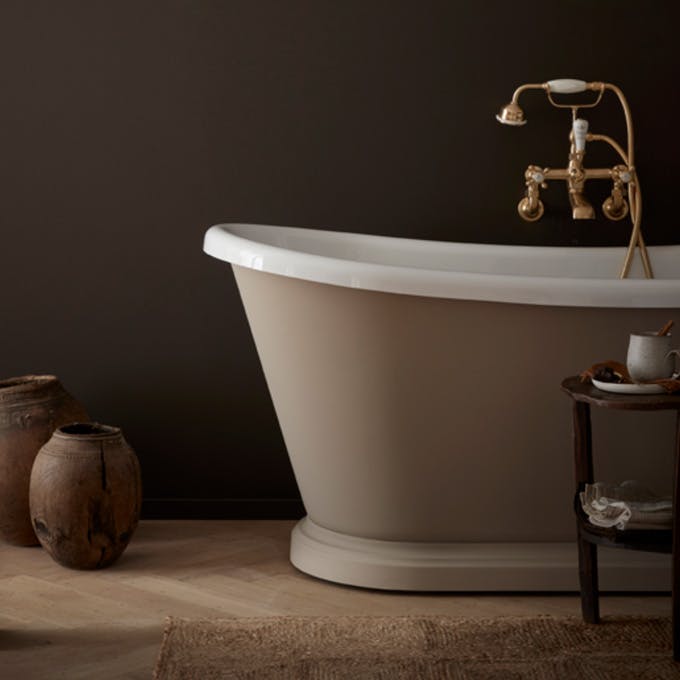 Bathroom colour drenched in deep brown shade 'Chocolate Colour' with a contrasting neutral (Rolling Fog - Dark) bath tub with gold taps.