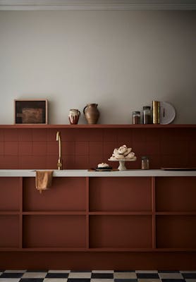 Kitchen with the upper wall painted in neutral shade 'Slaked Lime - Mid' and the lower wall and cabinets in terracotta 'Muscovado'.