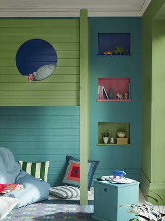 Panelled children's bedroom painted in turquoise 'Canton' and deep green 'Garden' with three shelves and a bunk bed.